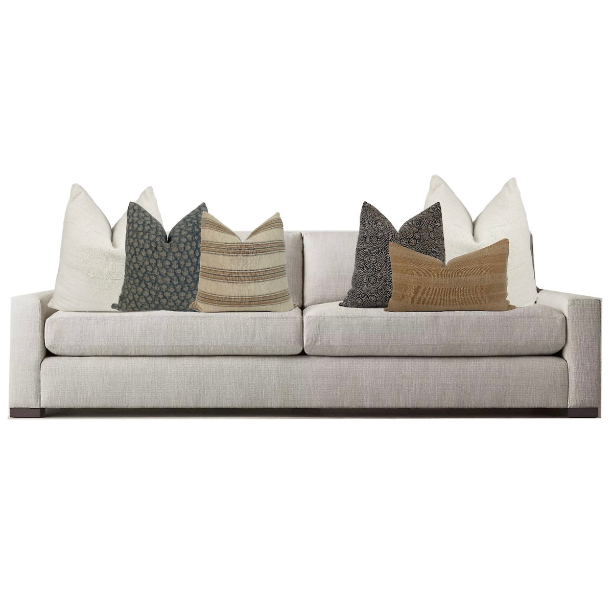 Amy Pillow Set on a gray couch