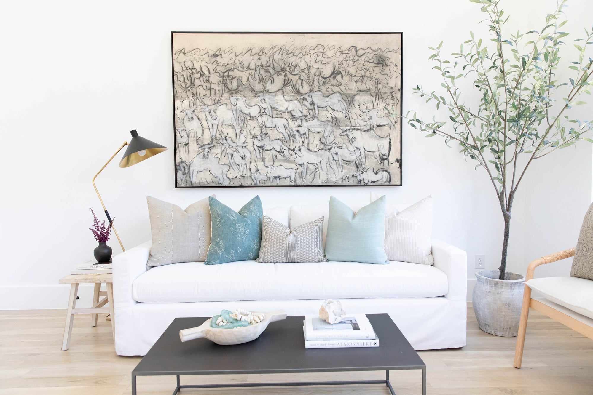 Aegean Stripe Designer Pillow Cover | String resting on a white sofa