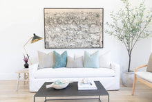 Aegean Stripe Designer Pillow Cover | String resting on a white sofa