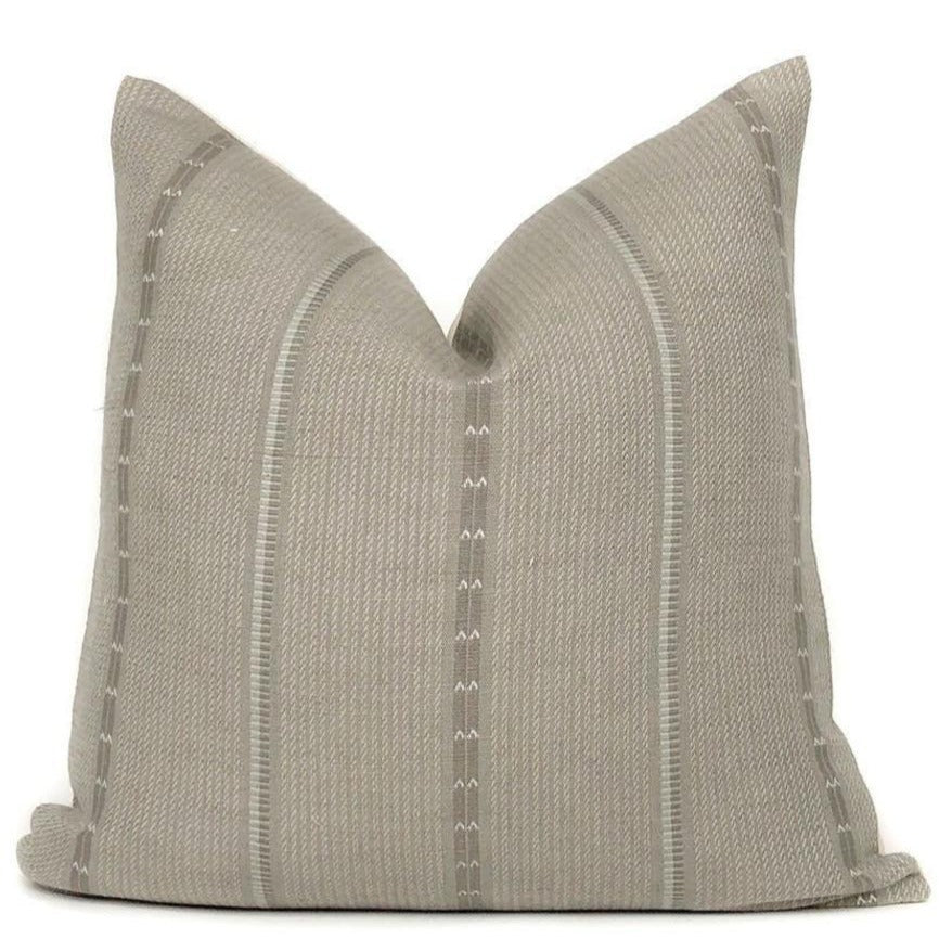 grey florence pillow cover with a white backround