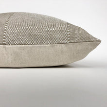 tan pillow on its side