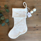 a white mudcloth stocking