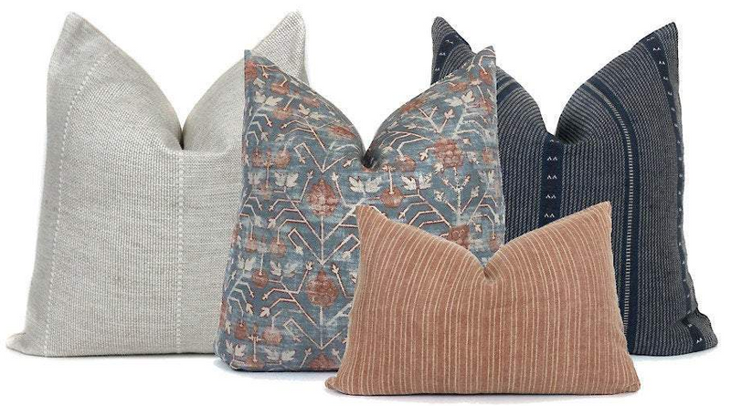 multiple pillows all in a row