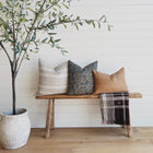 Fall Pillow Set featuring a beige striped pillow, a blue and green floral pillow, and a rust lumbar pillow cover by One Affirmation. 